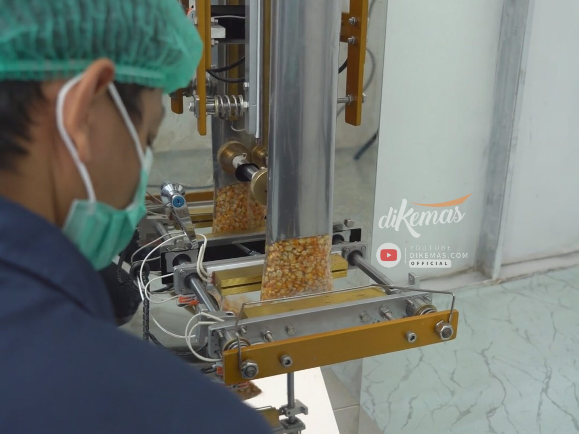 Mesin Packing Jagung dengan Plastik Kemasan