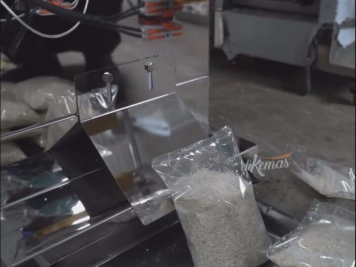 mesin bungkus beras 1kg 5kg