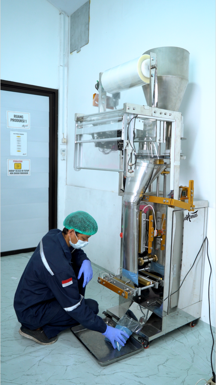 mesin packaging pupuk otomatis